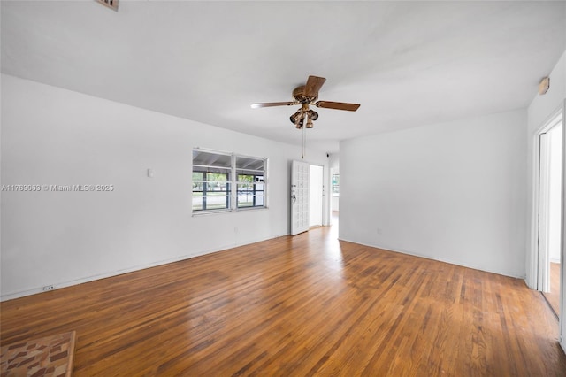 790 NE 96th St, Miami Shores, FL 33138 - empty room featuring a ceiling fan and wood finished floors