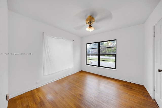 790 NE 96th St, Miami Shores, FL 33138 - spare room with baseboards, a ceiling fan, and wood finished floors