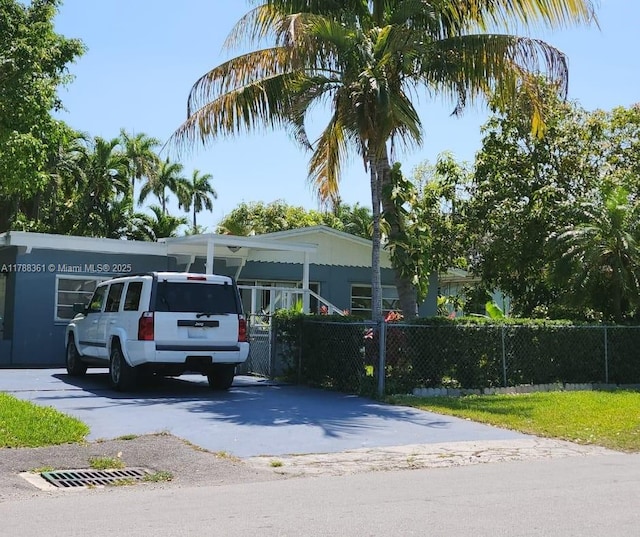 1440 NE 117th St, Miami, FL 33161 - view of front of property featuring fence