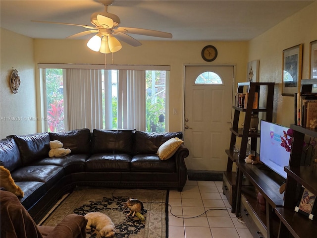 1440 NE 117th St, Miami, FL 33161 - living room featuring light tile patterned floors and a ceiling fan
