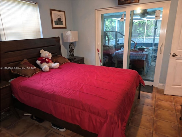 1440 NE 117th St, Miami, FL 33161 - tiled bedroom featuring access to outside