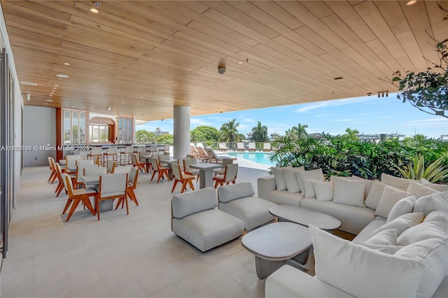 2655 S Bayshore Dr Unit 1607, Miami, FL 33133 - view of patio / terrace featuring a fenced in pool and an outdoor hangout area