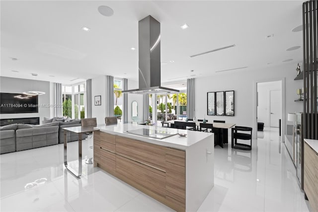 kitchen featuring modern cabinets, a wealth of natural light, and light tile patterned floors