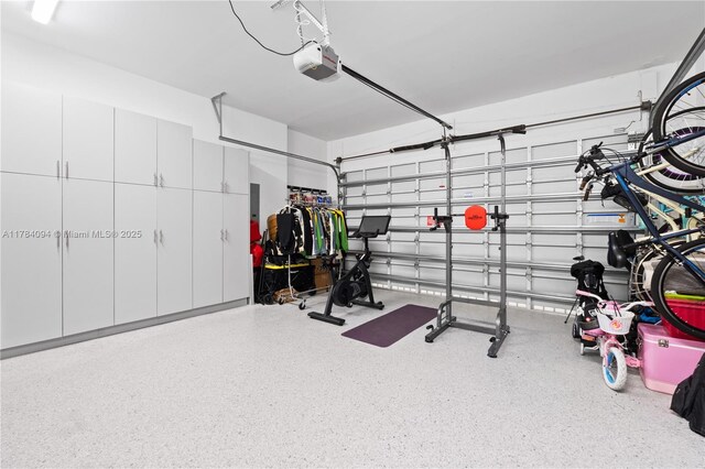 garage featuring a garage door opener