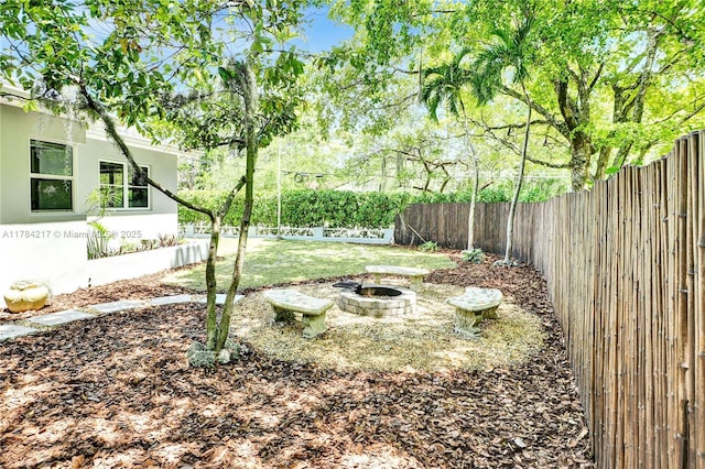 5700 NE 5th Ave, Miami, FL 33137 - fenced backyard featuring a fire pit