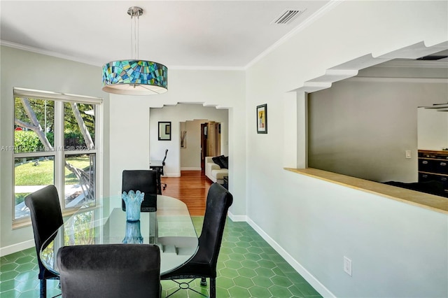 5700 NE 5th Ave, Miami, FL 33137 - dining area with crown molding and baseboards