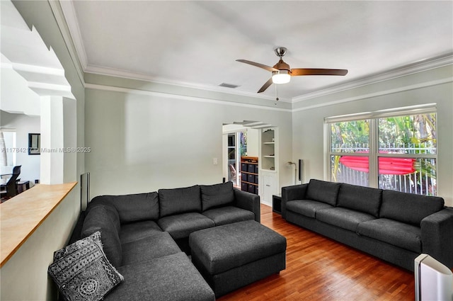 5700 NE 5th Ave, Miami, FL 33137 - living area with wood finished floors, crown molding, and ceiling fan