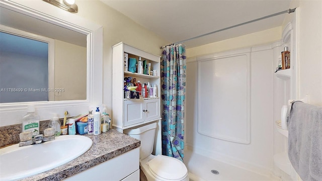 13715 Kendale Lakes Cir Unit Ph-A10, Miami, FL 33183 - bathroom featuring toilet, vanity, and a stall shower