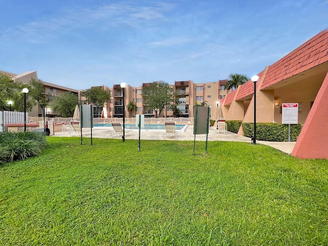 13715 Kendale Lakes Cir Unit Ph-A10, Miami, FL 33183 - exterior space with a community pool and fence