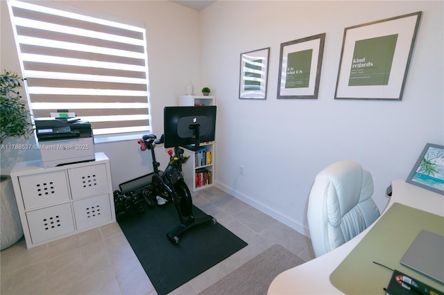 office area featuring light tile patterned flooring