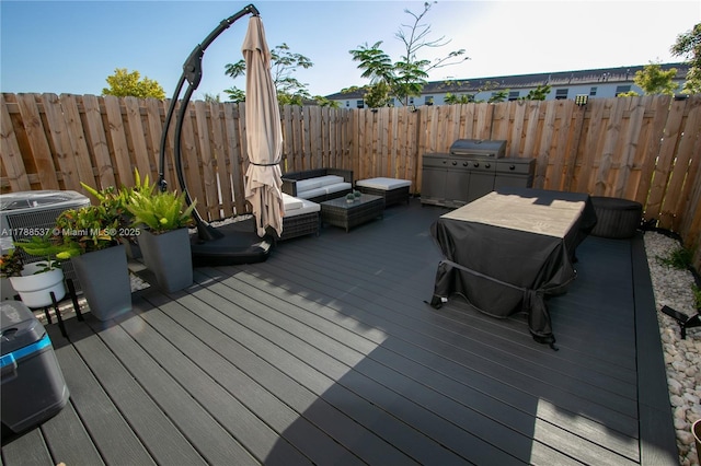 wooden deck featuring fence