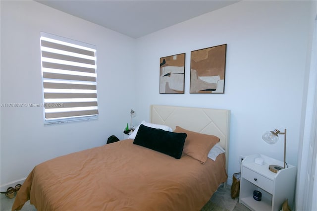 bedroom with multiple windows