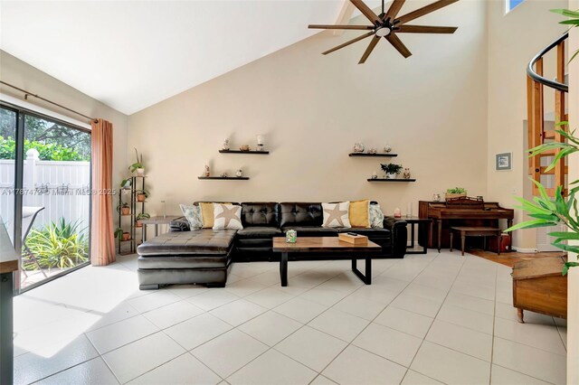 17068 Traverse Cir, Jupiter, FL 33477 - living room featuring high vaulted ceiling, plenty of natural light, a ceiling fan, and light tile patterned flooring