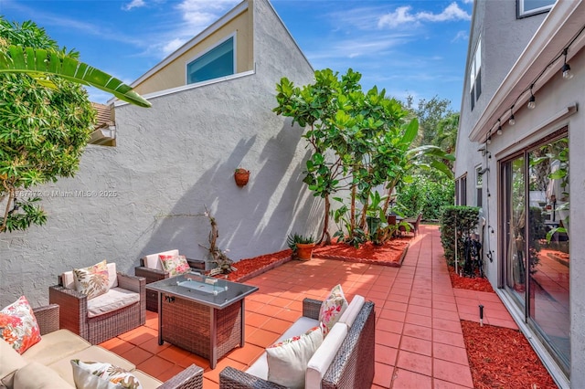 17068 Traverse Cir, Jupiter, FL 33477 - view of patio featuring an outdoor living space