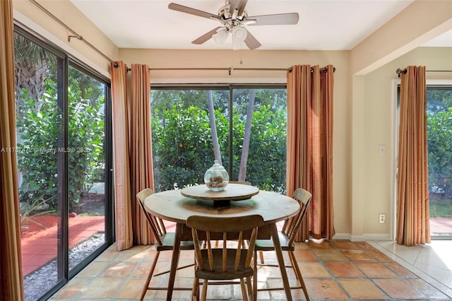 17068 Traverse Cir, Jupiter, FL 33477 - dining space with ceiling fan, healthy amount of natural light, and baseboards