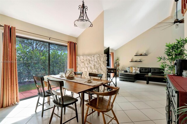 17068 Traverse Cir, Jupiter, FL 33477 - dining area featuring high vaulted ceiling, light tile patterned floors, and a ceiling fan