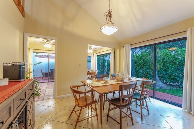 17068 Traverse Cir, Jupiter, FL 33477 - dining area featuring light tile patterned flooring, high vaulted ceiling, ceiling fan, and baseboards