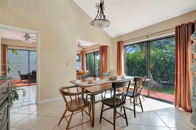 17068 Traverse Cir, Jupiter, FL 33477 - dining area with ceiling fan, high vaulted ceiling, light tile patterned floors, and baseboards