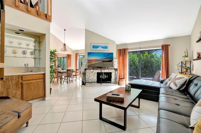 17068 Traverse Cir, Jupiter, FL 33477 - living area with plenty of natural light, light tile patterned floors, and high vaulted ceiling