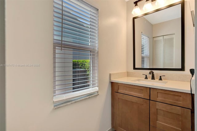 17068 Traverse Cir, Jupiter, FL 33477 - bathroom featuring vanity and baseboards