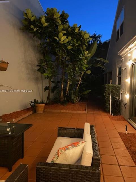 17068 Traverse Cir, Jupiter, FL 33477 - view of patio featuring an outdoor hangout area