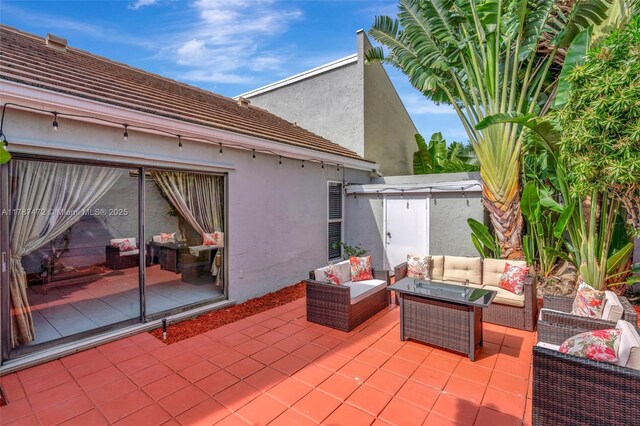 17068 Traverse Cir, Jupiter, FL 33477 - view of patio featuring an outdoor hangout area