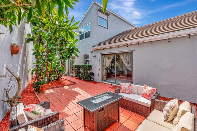 17068 Traverse Cir, Jupiter, FL 33477 - view of patio / terrace featuring outdoor lounge area