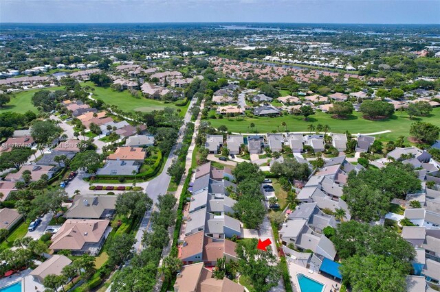 17068 Traverse Cir, Jupiter, FL 33477 - aerial view of property and surrounding area with nearby suburban area, a golf course, and a pool area