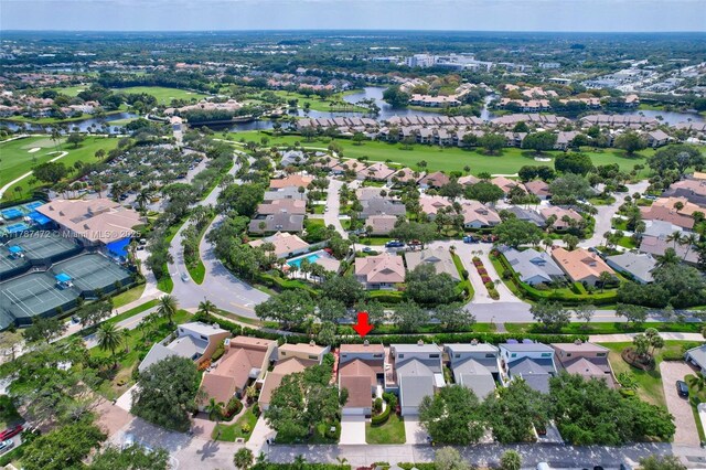 17068 Traverse Cir, Jupiter, FL 33477 - aerial overview of property's location with a local golf course, nearby suburban area, and a large body of water