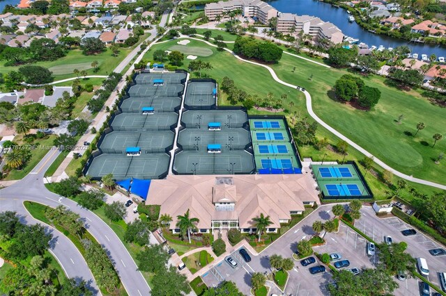 17068 Traverse Cir, Jupiter, FL 33477 - aerial view of property and surrounding area with a local golf course, a large body of water, and nearby suburban area