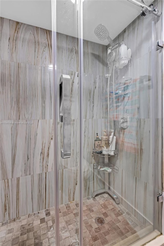 455 Paradise Isle Blvd Unit 106, Hallandale Beach, FL 33009 - bathroom featuring a marble finish shower