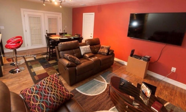 6472 Johnson St, Hollywood, FL 33024 - living area with baseboards, french doors, and wood finished floors