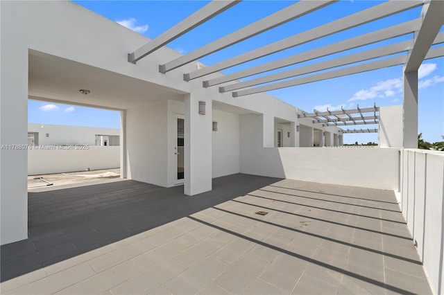 view of patio featuring a pergola