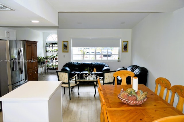 dining room featuring visible vents, recessed lighting, and light wood finished floors
