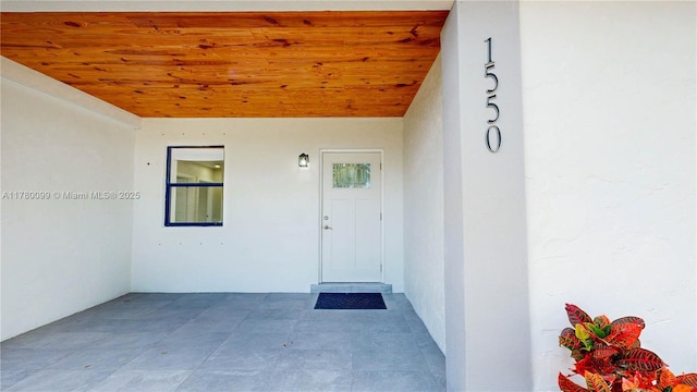 1550 NE 11th St, Homestead, FL 33033 - property entrance featuring stucco siding