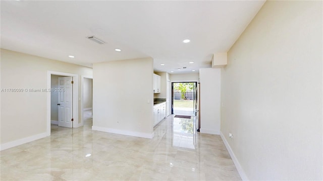 1550 NE 11th St, Homestead, FL 33033 - empty room with recessed lighting, light marble finish floors, and baseboards