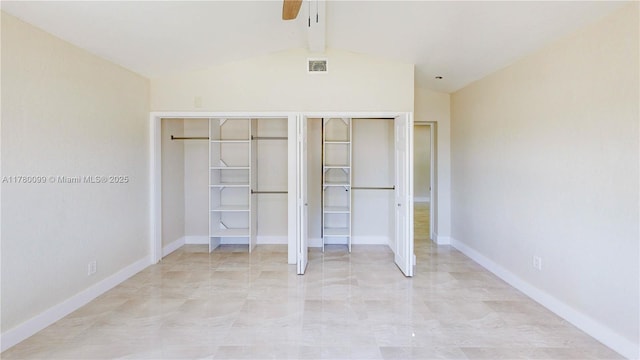 1550 NE 11th St, Homestead, FL 33033 - unfurnished bedroom featuring multiple closets, a ceiling fan, light marble finish flooring, and baseboards