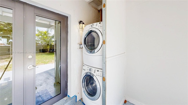 1550 NE 11th St, Homestead, FL 33033 - washroom featuring stacked washer and clothes dryer