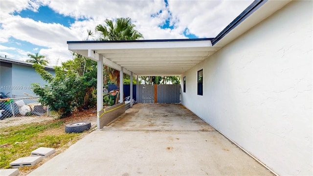 1550 NE 11th St, Homestead, FL 33033 - view of car parking with a carport