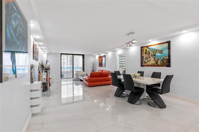 2500 Parkview Dr Unit 1121, Hallandale Beach, FL 33009 - dining area with baseboards, marble finish floor, and recessed lighting