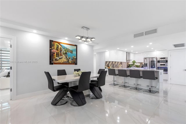 2500 Parkview Dr Unit 1121, Hallandale Beach, FL 33009 - dining room with recessed lighting, visible vents, and marble finish floor