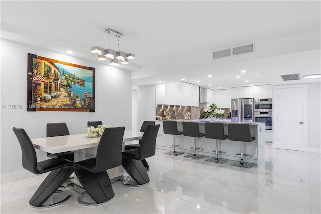 2500 Parkview Dr Unit 1121, Hallandale Beach, FL 33009 - dining area featuring marble finish floor, baseboards, visible vents, and recessed lighting