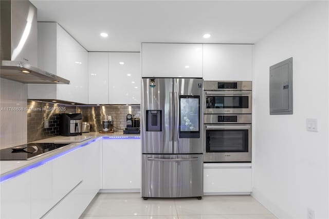 2500 Parkview Dr Unit 1121, Hallandale Beach, FL 33009 - kitchen with wall chimney exhaust hood, stainless steel appliances, white cabinets, electric panel, and modern cabinets