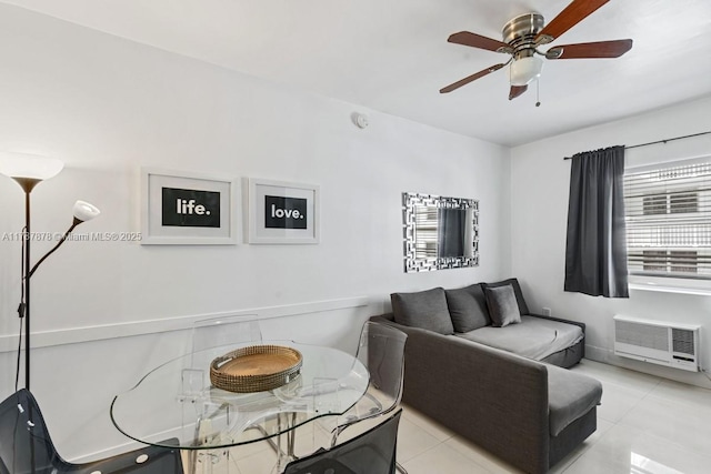 335 Ocean Dr Unit 310, Miami Beach, FL 33139 - living area with an AC wall unit, a ceiling fan, and light tile patterned floors