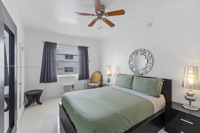 335 Ocean Dr Unit 310, Miami Beach, FL 33139 - bedroom featuring visible vents, baseboards, tile patterned flooring, and ceiling fan