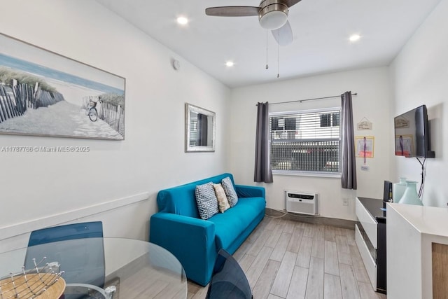 335 Ocean Dr Unit 122, Miami Beach, FL 33139 - living area with recessed lighting, wood finished floors, a ceiling fan, baseboards, and a wall mounted AC