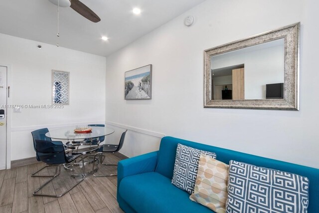 335 Ocean Dr Unit 122, Miami Beach, FL 33139 - living room featuring a ceiling fan, wood finished floors, and recessed lighting