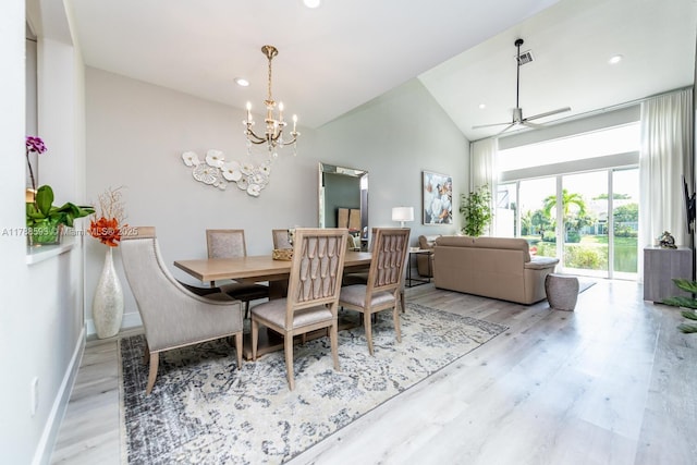 5134 W Madison Lakes Cir W, Davie, FL 33328 - dining area featuring recessed lighting, wood finished floors, ceiling fan with notable chandelier, baseboards, and high vaulted ceiling