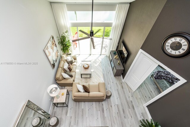5134 W Madison Lakes Cir W, Davie, FL 33328 - living area with wood finished floors and a high ceiling