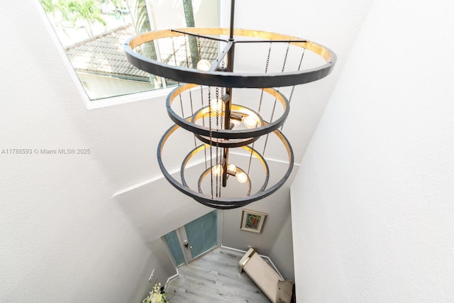 5134 W Madison Lakes Cir W, Davie, FL 33328 - room details featuring a chandelier and wood finished floors